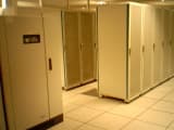 Rows of server racks in a data center.
